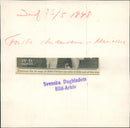 Graduate student Britta Carlsson carrying flowers - Vintage Photograph