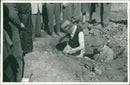 King Gustaf VI Adolf has interested viewers around him while digging for ancient finds. - Vintage Photograph