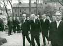 King Gustaf VI Adolf arrives at the Linnaeus exhibition surrounded by Birger Strandell, Olof Selling and Olov Rylander - Vintage Photograph
