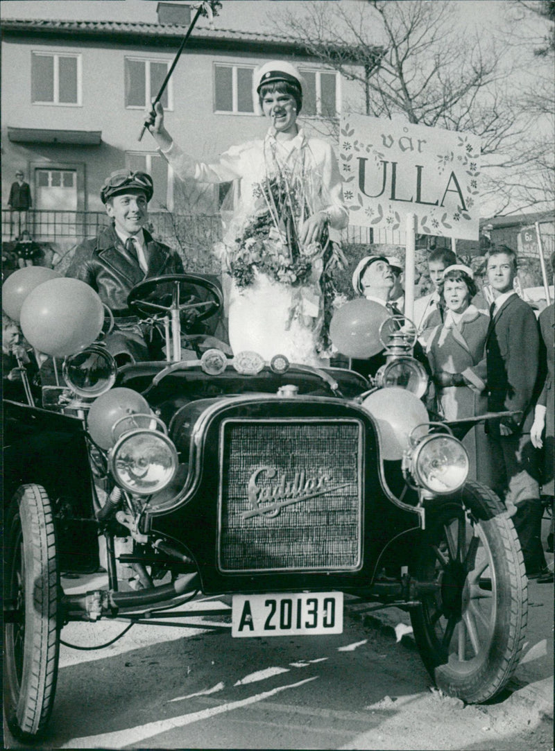 New student Ulla Victor is riding in the oldest car cadillac. - Vintage Photograph