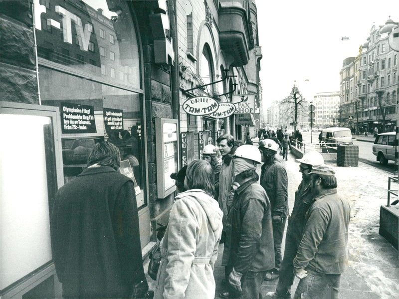 People watching the Olympic competitions - Vintage Photograph