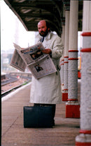 British writer Keith Skipper reads newspaper - Vintage Photograph
