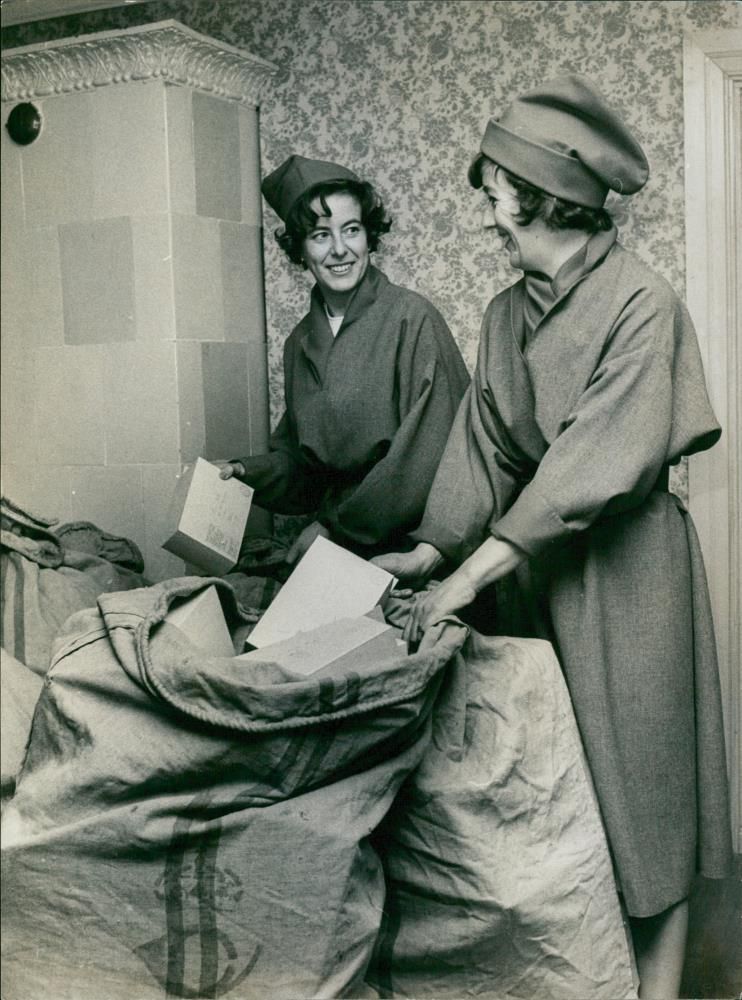 Two women at Christmas gift bag - Vintage Photograph