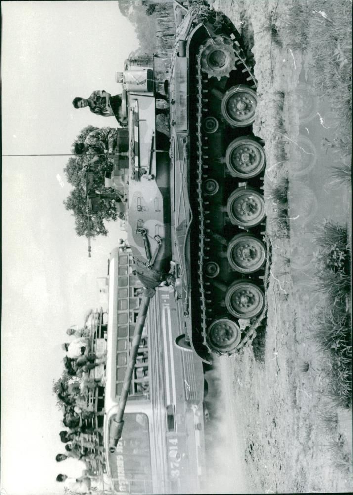 Thai tank and passing bus - Vintage Photograph