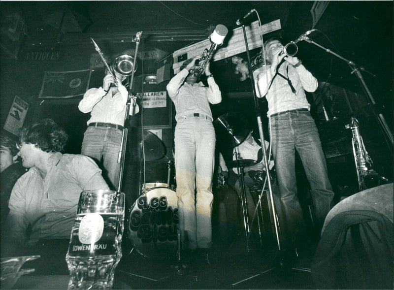 Musicians blowing instruments on stage at restaurant Stampen - Vintage Photograph