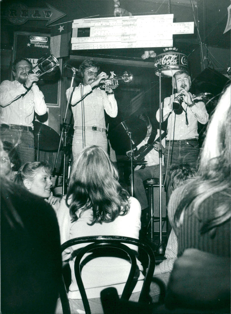 Musicians blowing instruments on stage at restaurant Stampen - Vintage Photograph