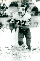 O. J. Simpson passes the 2000 yard mark - Vintage Photograph