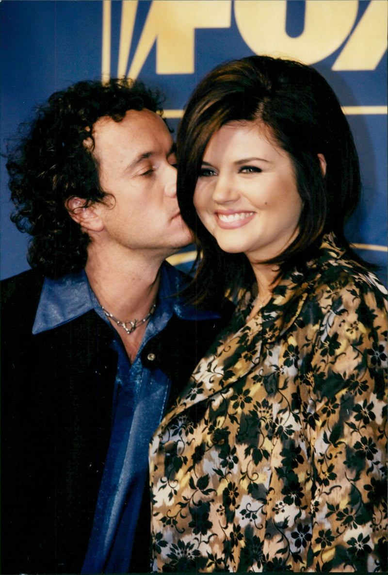 Tiffany Amber Thiessen and her husband. - Vintage Photograph