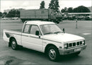 Isuzu Cars - Vintage Photograph