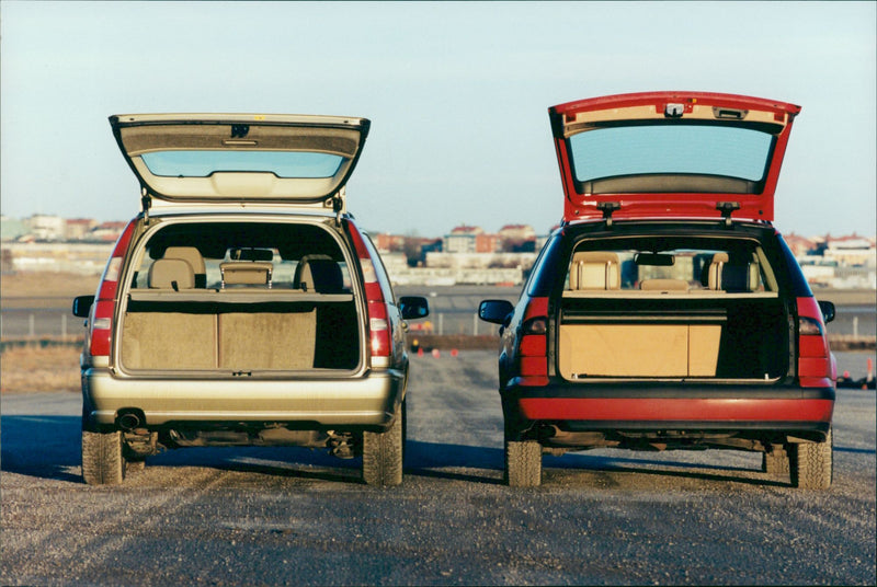 Luggage is compared between the Volvo V70 GLT and Saab 9 5 combi - Vintage Photograph