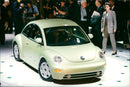 Volkswagen's new "folk bubble" Beetle is showing in Detroit - Vintage Photograph