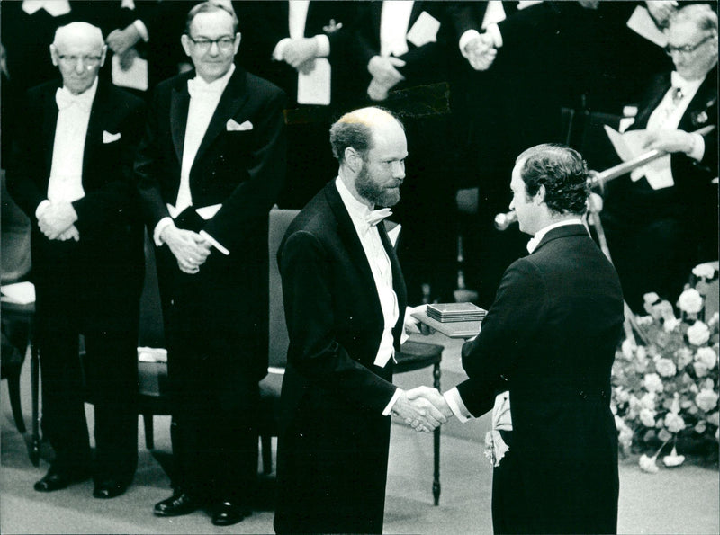 American astronomer Robert Wilson receives his Nobel's prize from Eung Carl Gustaf. - Vintage Photograph
