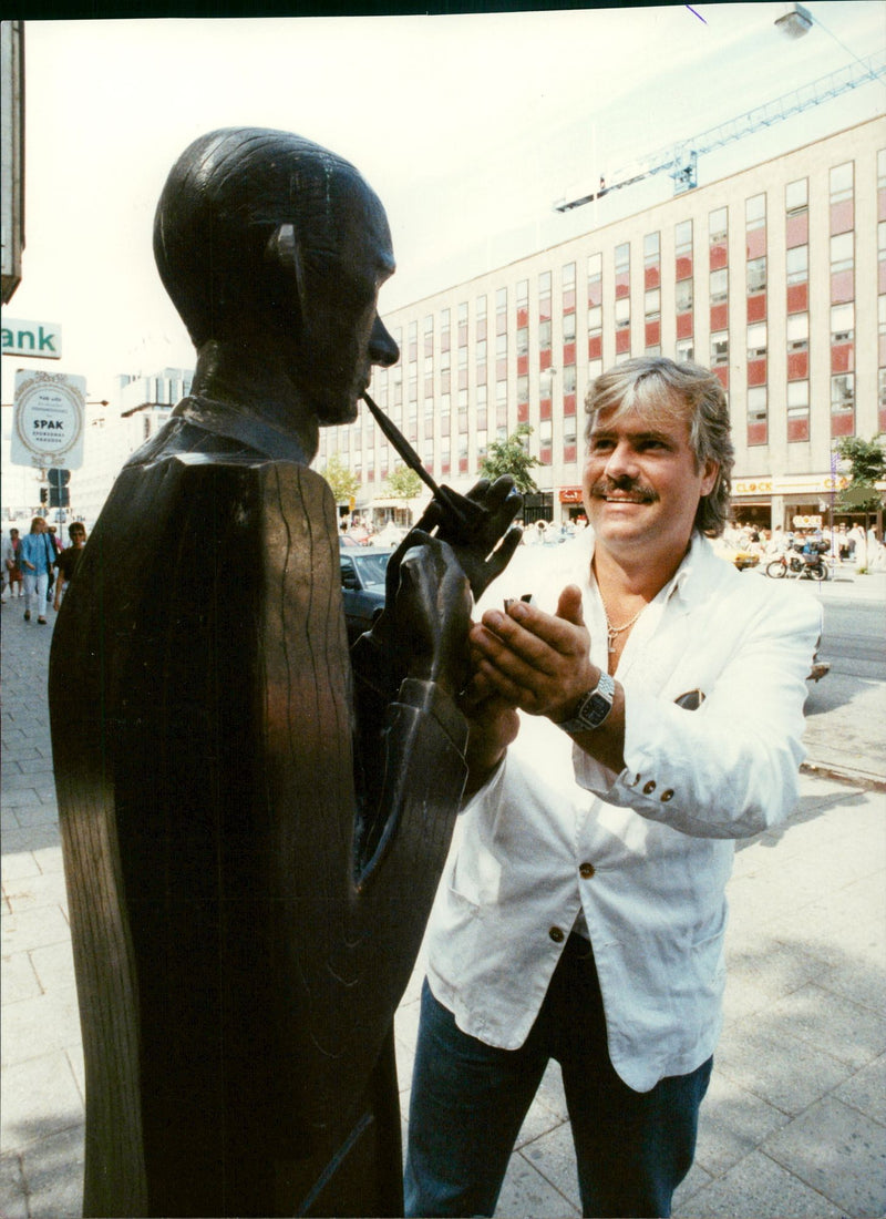 Rolf Wikstrom, Musician at the statue of Nils Ferlin - Vintage Photograph