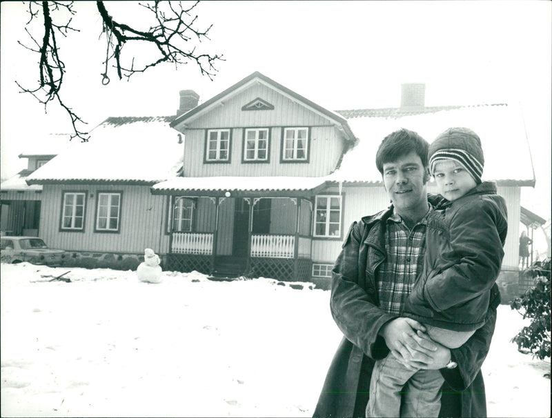 Karl Erik Olsson, politician, with his son during winter - Vintage Photograph