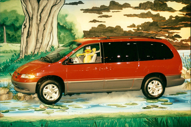 The Chrysler-Dodge Caravan minivan appears at the Detroit auto show - Vintage Photograph
