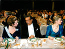 Nobel dinner. Nobel Laureate in Literature Derek Walcott with Mia Bildt and Princess Christina - Vintage Photograph