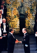 Derek Walcott receives the Nobel Prize in literature from King Carl XVI Gustaf's hand - Vintage Photograph