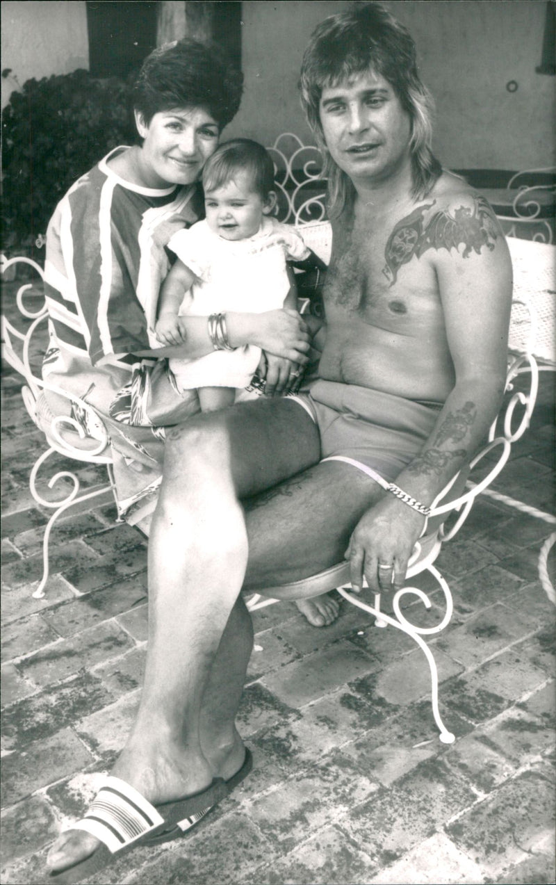 Ozzy Osbourne, musician, with his wife and child - Vintage Photograph