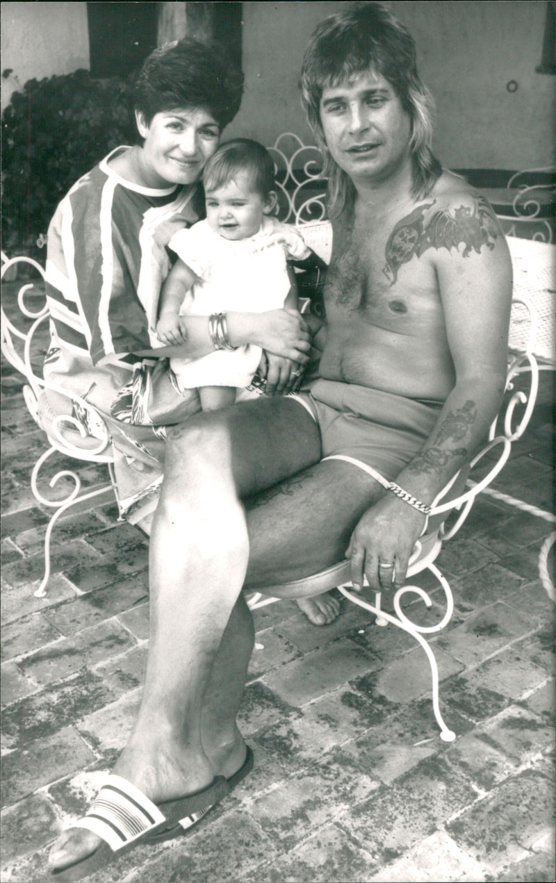 Ozzy Osbourne, musician, with his wife and child - Vintage Photograph