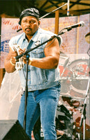 NEVILLE AT 25th ANNIVERSARY OF WOODSTOCK CONCERT - Vintage Photograph