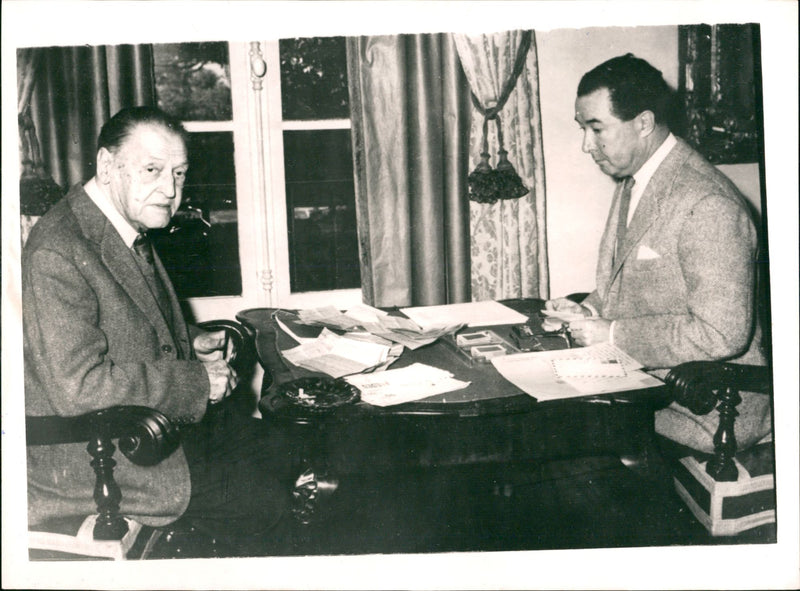 English Author Somerset Maugham celebrates his 89th birthday at his Riviera villa with his adopted son Alan Searle. - Vintage Photograph