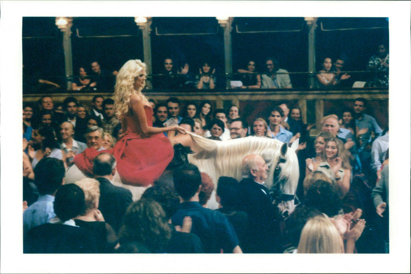 Swedish photo model Victoria Silvstedt on a horse in the TV show "Fenomeni" - Vintage Photograph