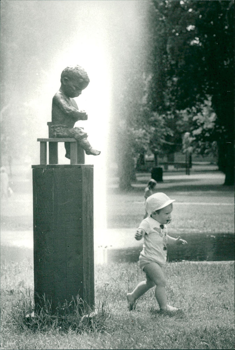 Stockholm: statues and sculptures. Boy with pea by Bitte Jonasson-Åkerlund - Vintage Photograph