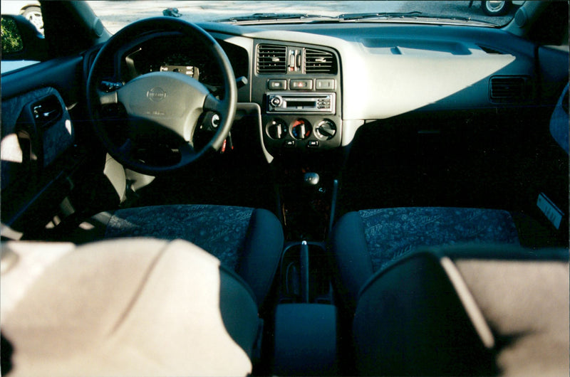 Nissan cars. - Vintage Photograph