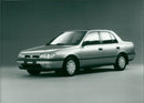 Nissan Sunny 4-d Sedan 1991 - Vintage Photograph