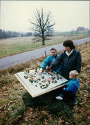 Agnes Karlsson, Éva Johansson and little Jonathan with Kalv village model - Vintage Photograph