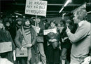 The protesters speak with Axel Borg, who represents the housing agency - Vintage Photograph
