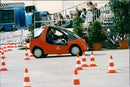 The cars. A tiny model is tried out at a security trail - Vintage Photograph