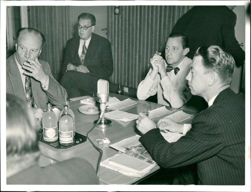 Right-hander Jarl Hjalmarsson answers questions from other politicians - Vintage Photograph