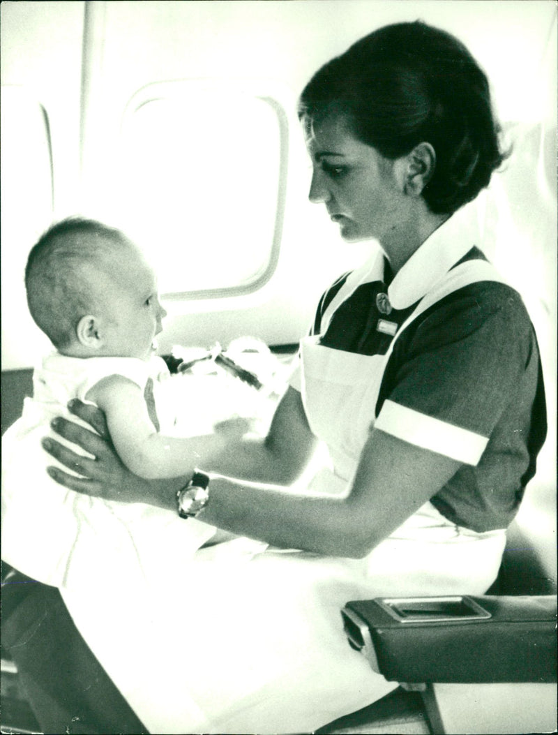 Child nurses aboard on planes. - Vintage Photograph