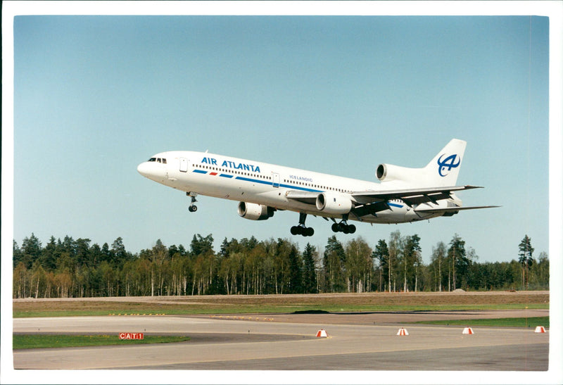 A Air Atlanta Icelandic aircraft with full of Chelsea supporters at Arlanda Airport - Vintage Photograph