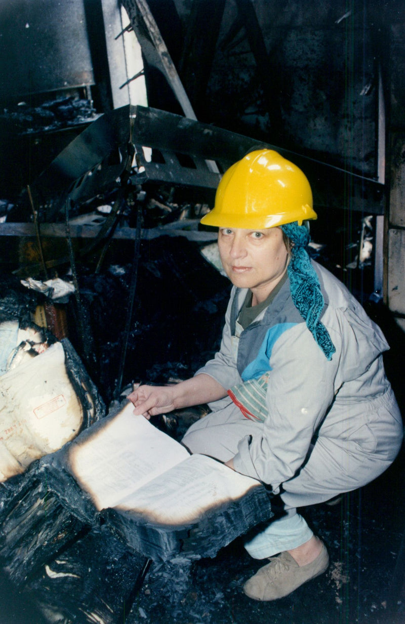 Library staff rescues books from the fire damaged Norwich Library - Vintage Photograph