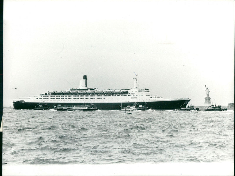 Cunarder Queen Elizabeth 2 and Statue of Liberty. - Vintage Photograph