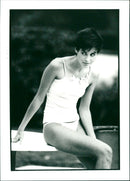 Model wearing a lace trim camisole top - Vintage Photograph