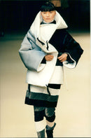 Model on a catwalk in clothing designed by fashion designer Issey Miyake - Vintage Photograph