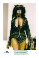 A model shows off one of the latest designs during a show by students from the Central St Martin's College - Vintage Photograph