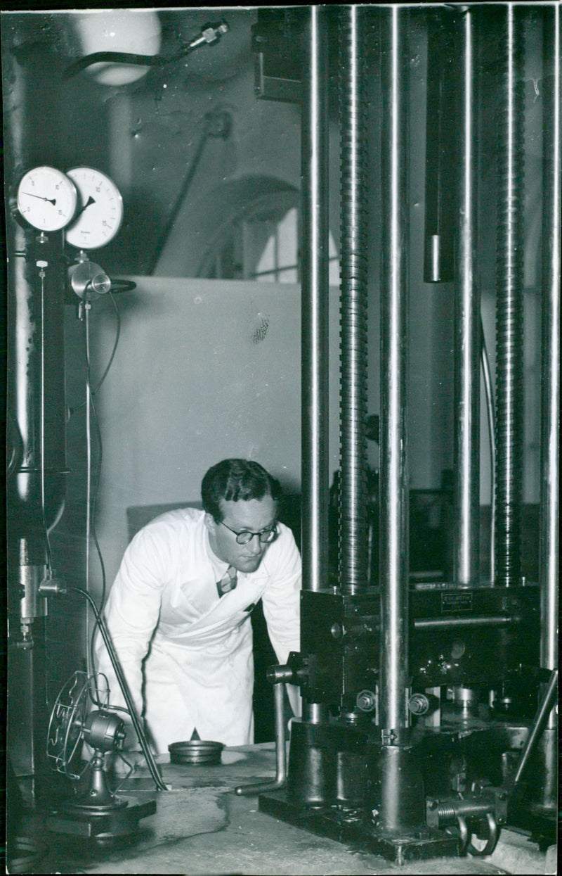 Engineer Schaub Examining an Apparatus for Testing the Refrigerator at the Institute of Technology - Vintage Photograph