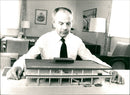 The Finance County Council Knut Nilsson is studying the model of the future terminal. - Vintage Photograph