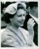 Queen Elizabeth smiling while driven along the Ascot course with the Duke of Edinburgh on this final day of the Royal meeting - Vintage Photograph