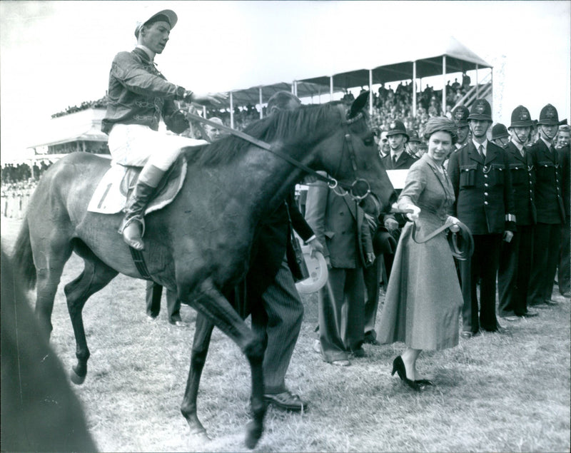 Queen Elizabeth II leading in her Oaks winner, Carozza, with Lester Piggott in the saddle - Vintage Photograph