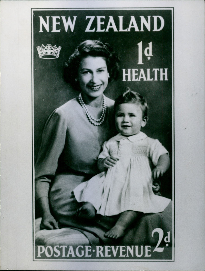 Queen Elizabeth II and Prince Charles as a baby on a stamp - Vintage Photograph