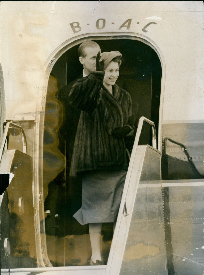 Queen Elizabeth II and Prince Philip waving to the crowd - Vintage Photograph