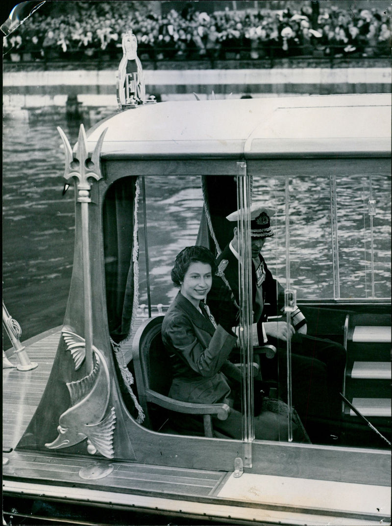Queen Elizabeth II in royal boat waving to the crowd - Vintage Photograph