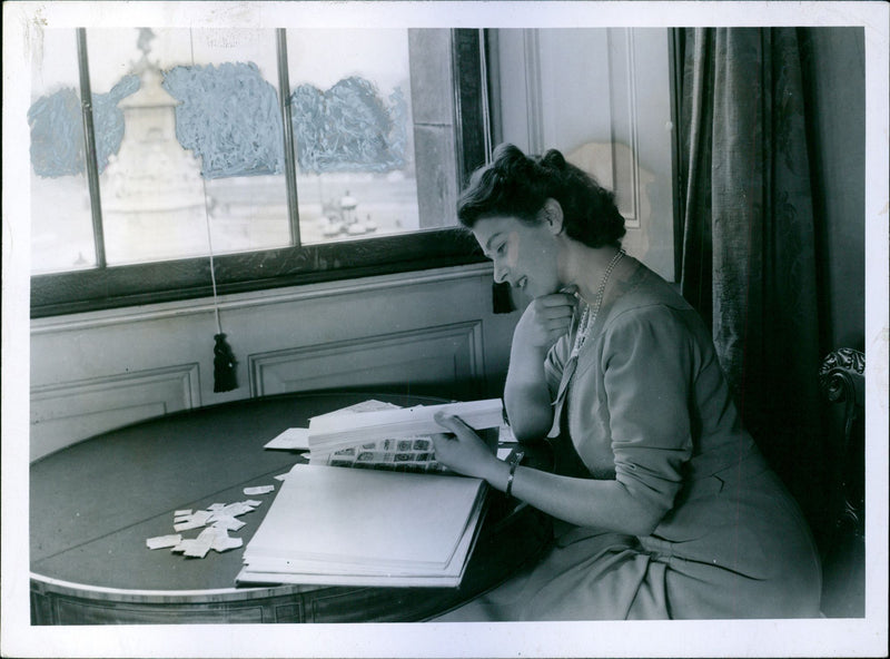 Princess Elizabeth in private apartment in Buckingham Palace showing her Stamp Collection - Vintage Photograph