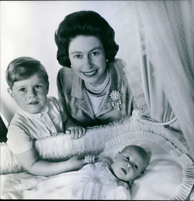 Queen Elizabeth II and Prince Andrew at the crib of Prince Edward - Vintage Photograph