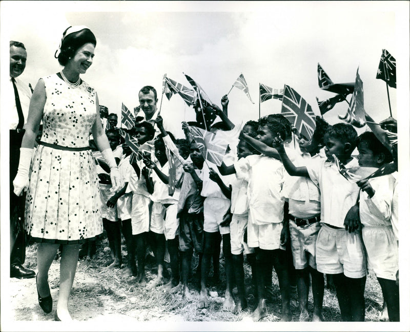 Queen Elizabeth II on New Zealand tour in 1970 - looking at flag-waving welcome from the crowd - Vintage Photograph